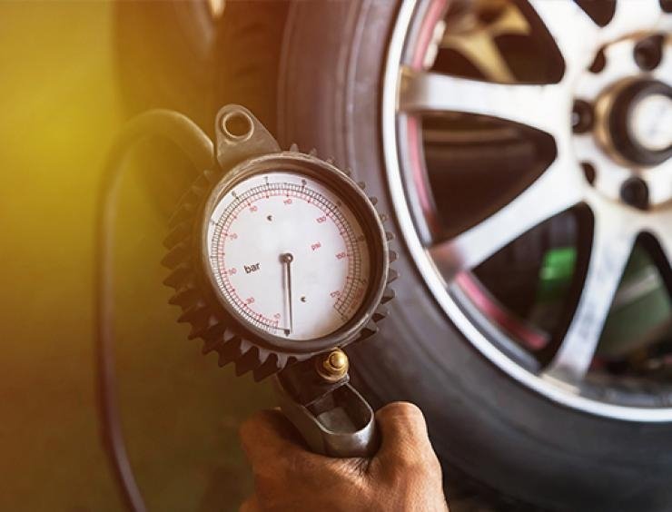 checking the pressure in tyres